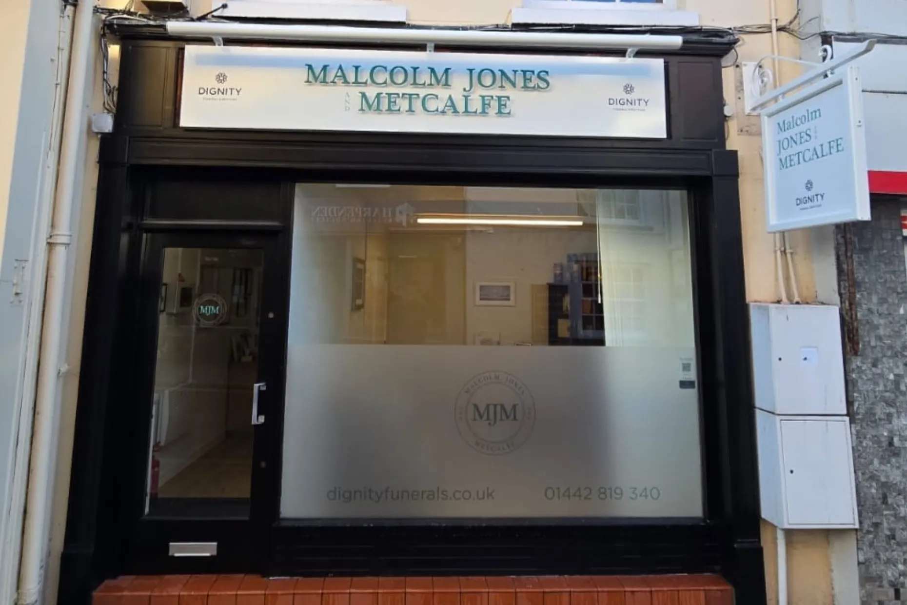 The entrance to Malcolm Jones & Metcalfe Funeral Directors on High Street, Tring.